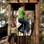 Climbing in the Alpine Adventure Park at Snowtrax in Dorset