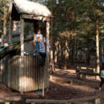 Climbing in the Alpine Adventure Park at Snowtrax in Dorset