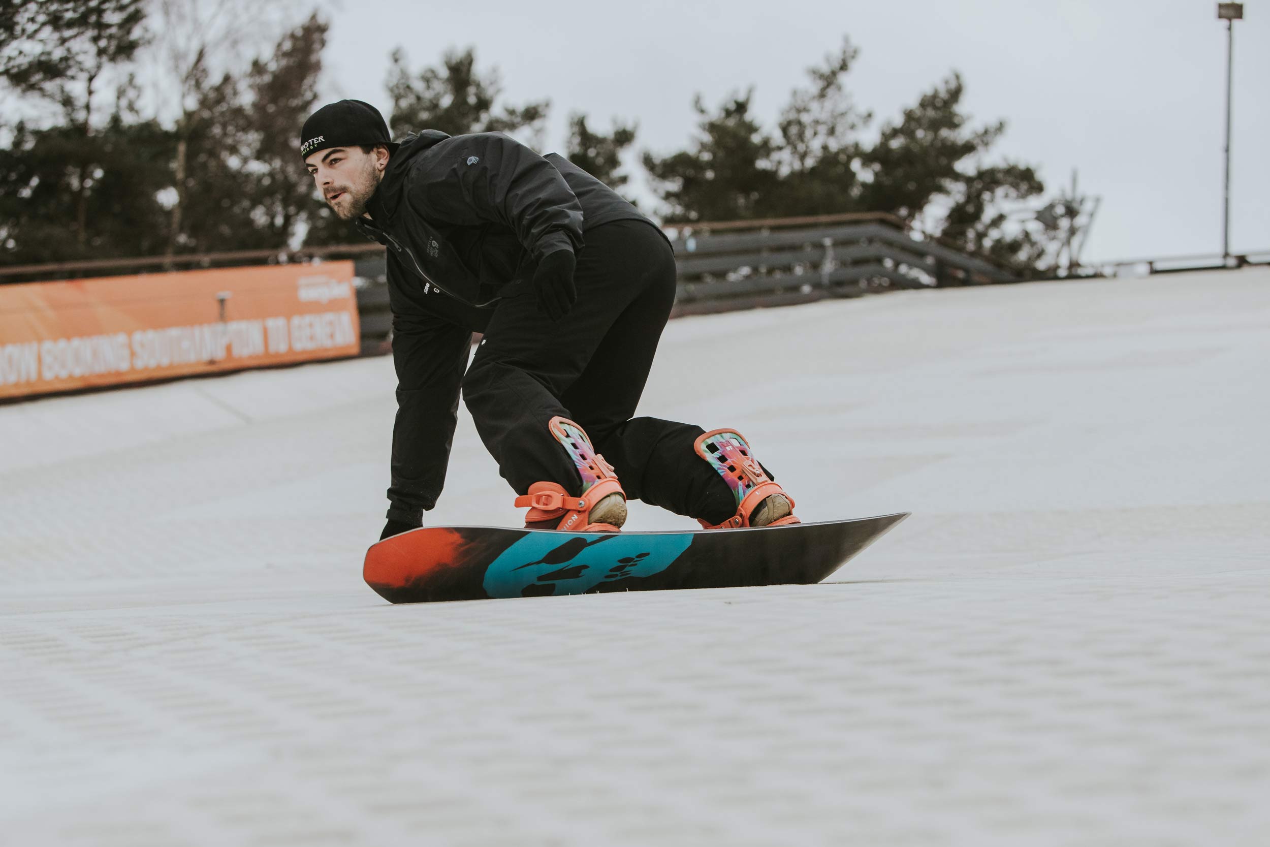 Snowboarder Carving at Snowtrax in Dorset